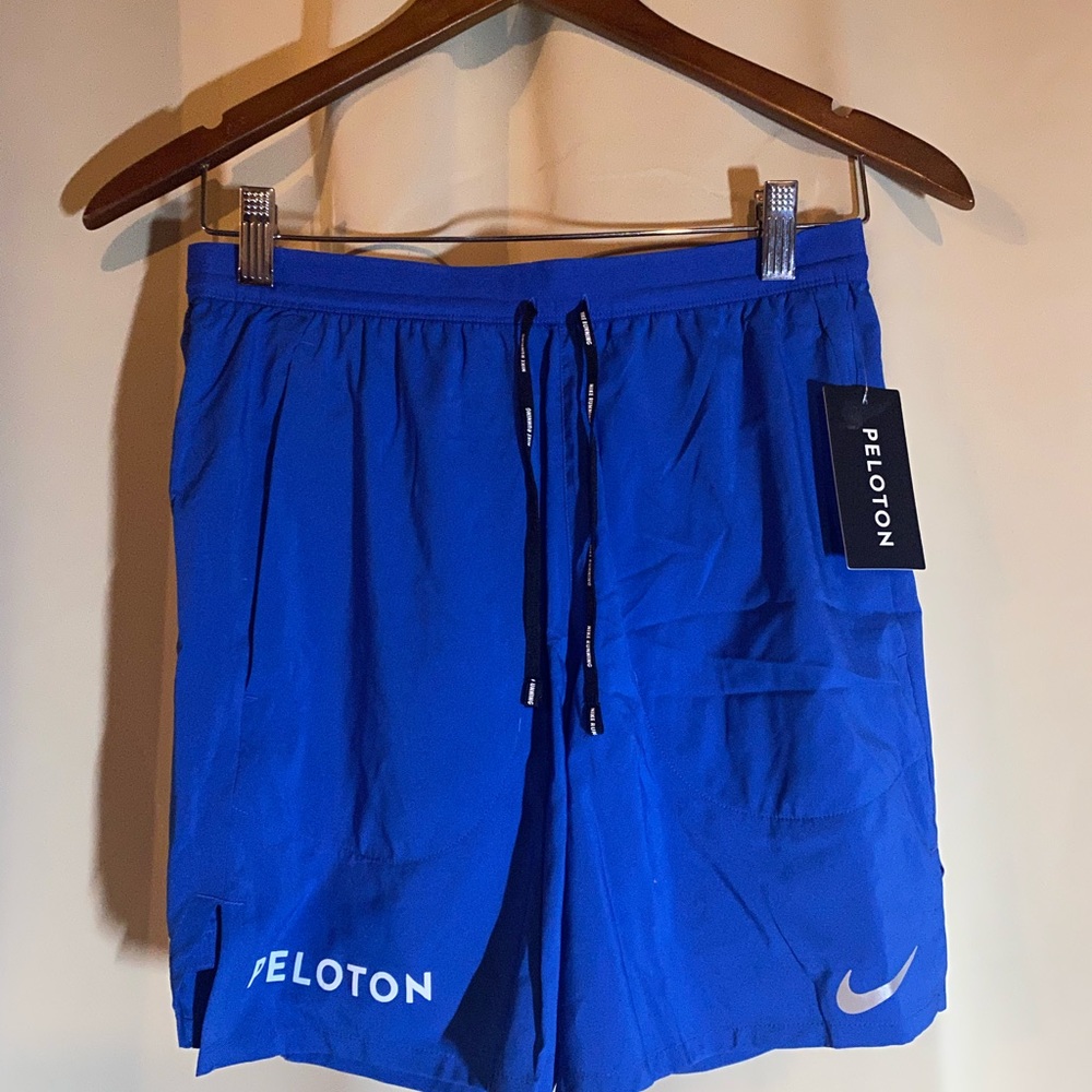 NWT Nike Peloton blue small shorts 7”